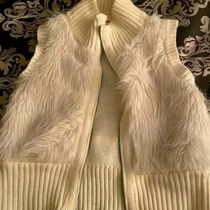 Cream colored turtle kneck vest